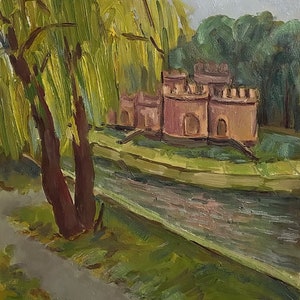 May include: A painting depicting a red brick building with a moat and a willow tree in the foreground. The building features a series of rounded towers and is surrounded by green grass and water.