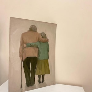 May include: A painting of an elderly couple holding each other from behind. The man is wearing a brown jacket and the woman is wearing a green jacket and a brown skirt. The man is holding a walking stick.