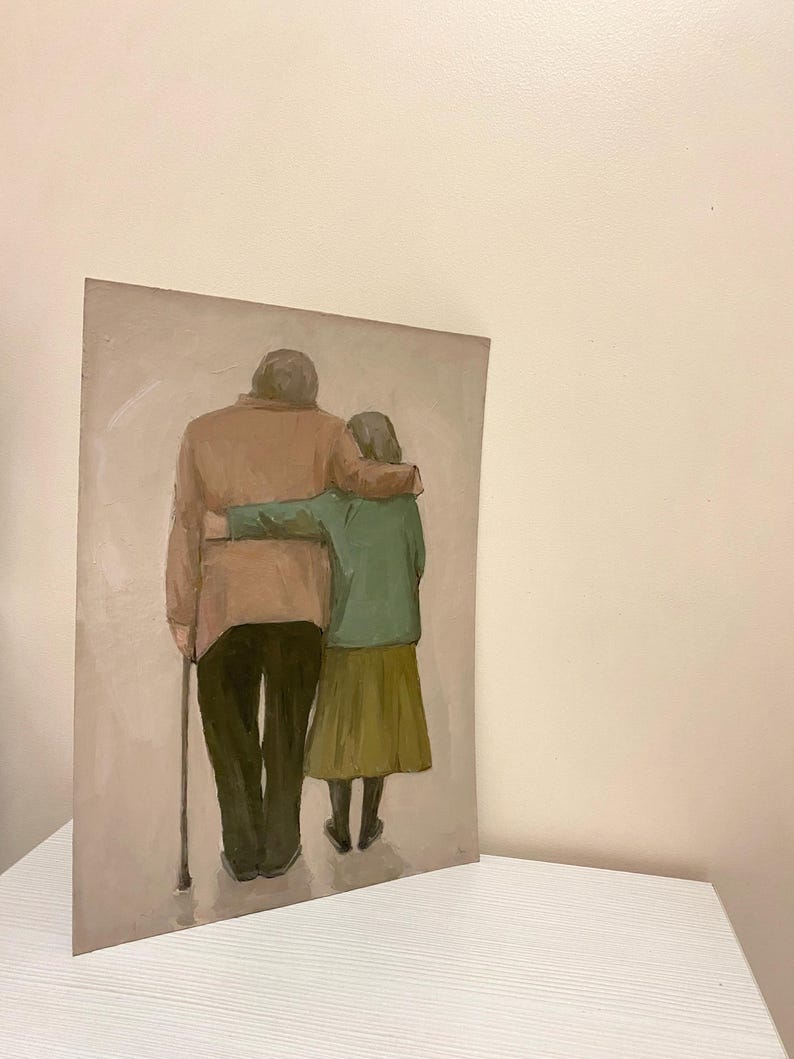 May include: A painting of an elderly couple holding each other from behind. The man is wearing a brown jacket and the woman is wearing a green jacket and a brown skirt. The man is holding a walking stick.