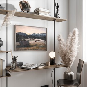 White wooden-framed artwork showcasing Geroldsee natural beauty.