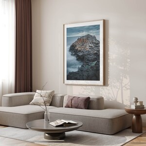 Wooden-framed print showcasing The Giants Causeways natural beauty.