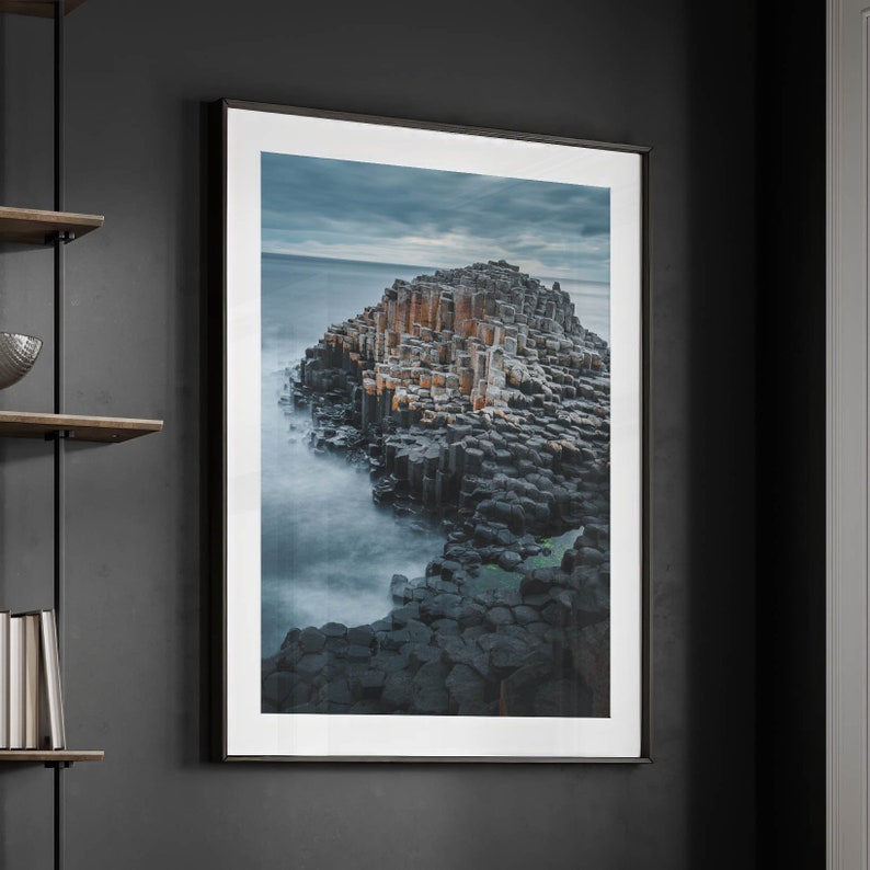 Room setting with The Giants Causeway coastal print on the wall.