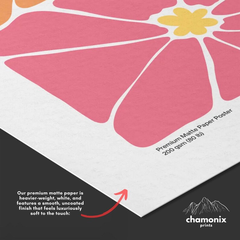 a close up of a paper with a flower on it