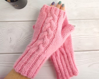 Pink fingerless mittens with a pattern