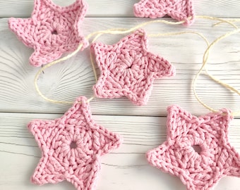 Sterngirlande rosa. Wanddekoration.