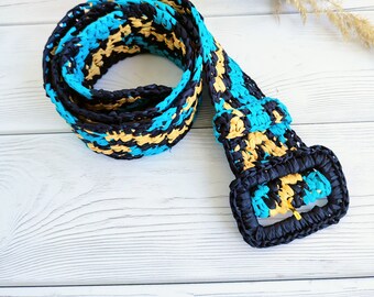 Snake print belt. Raffia belt with ornament.