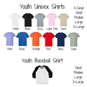 a collection of youth unisex shirts in various colors and sizes, including a youth baseball shirt.