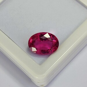 Gema de turmalina rubelita rosa-avermelhada, 8,83 quilates, oval, originária do Congo. imagem 5