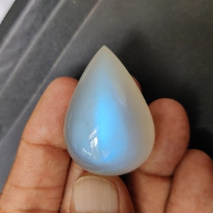 Rainbow Blue Moonstone Milky &quot; BIGGEST SIZE PEAR&quot; Extra Unique Quality Rarest Size Cabochon Clean Stone Size 37x26x16.70 mm. 111.28 carat