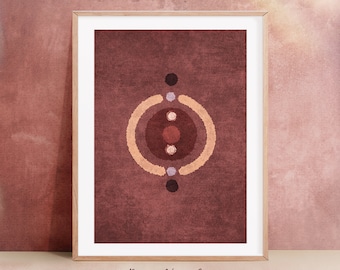 May include: A digital art print featuring a geometric design in shades of brown, orange, and purple. The design incorporates concentric circles and dots. The print is framed in a light wood frame. The text "Boho New Art" and "Emel Tunaboylu" is printed below the image.