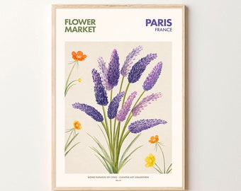 May include: A framed print of a botanical illustration of purple lavender flowers with green stems and leaves. The print has the text "FLOWER MARKET" and "PARIS FRANCE" at the top and "BOND FLOWERS OF CITIES - CURATED ART COLLECTION" at the bottom.