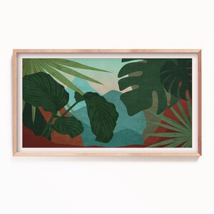 May include: A framed print featuring a stylized illustration of tropical leaves and mountains in shades of green, blue, and brown.