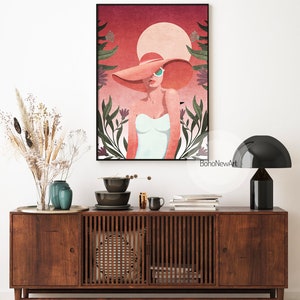 May include: A digital illustration of a woman wearing a large pink hat and sunglasses, standing in front of a red and pink sunset with green foliage.