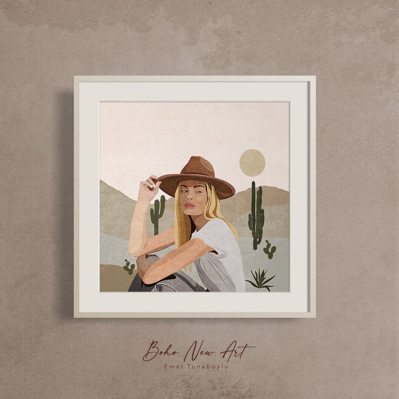 Puede incluir: Una ilustraci&oacute;n digital de una mujer con un sombrero vaquero marr&oacute;n y una camiseta blanca, sentada en un paisaje des&eacute;rtico con cactus y un gran sol de fondo. El texto "Boho New Art" y "Emel Tunaboylu" est&aacute; en la parte inferior de la imagen.