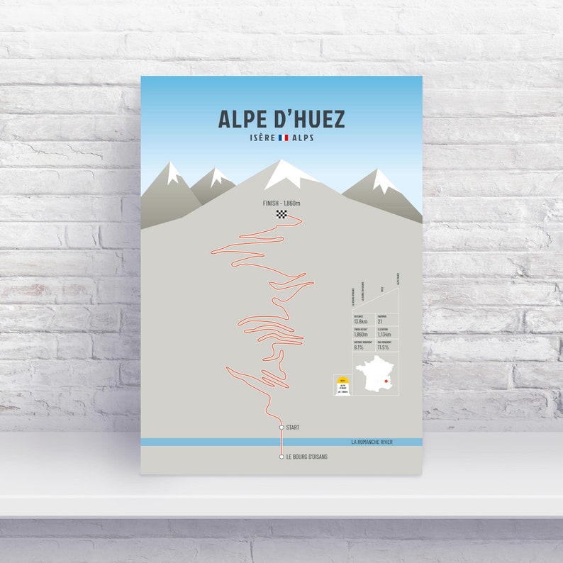 May include: A graphic illustration of the Alpe d'Huez cycling climb in the French Alps. The illustration shows the winding road up the mountain with elevation markers and distances. The text "Alpe d'Huez Is&egrave;re Alps" is at the top of the illustration.