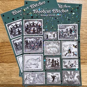 May include: A stack of "Woodcut Witches" medieval sticker sheets. Each sheet is dark teal with a glittery finish and features multiple black and white illustrations of witches and medieval scenes. The text "Woodcut Witches" is printed at the top.