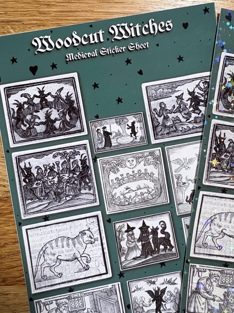 May include: A sticker sheet titled "Woodcut Witches Medieval Sticker Sheet" with various black and white illustrations of witches and medieval scenes. The stickers are on a dark green background with star and heart accents.