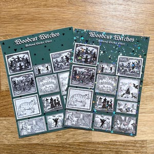 May include: Two sticker sheets with the text "Woodcut Witches Medieval Sticker Sheet" on a green background. Each sheet features multiple black and white illustrations of witches and medieval scenes. One sheet has a glittery finish.