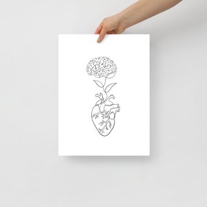 May include: A black and white line drawing of a brain growing from a heart. The brain is styled as a flower with leaves.