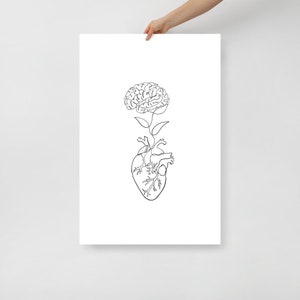 May include: A black and white line drawing of a brain growing from a heart. The brain is styled as a flower with leaves.
