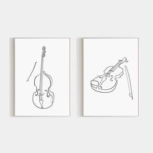 May include: Two framed art prints featuring line drawings of musical instruments. One print shows a double bass with a bow, and the other depicts a violin with a bow. The illustrations are in black against a white background.