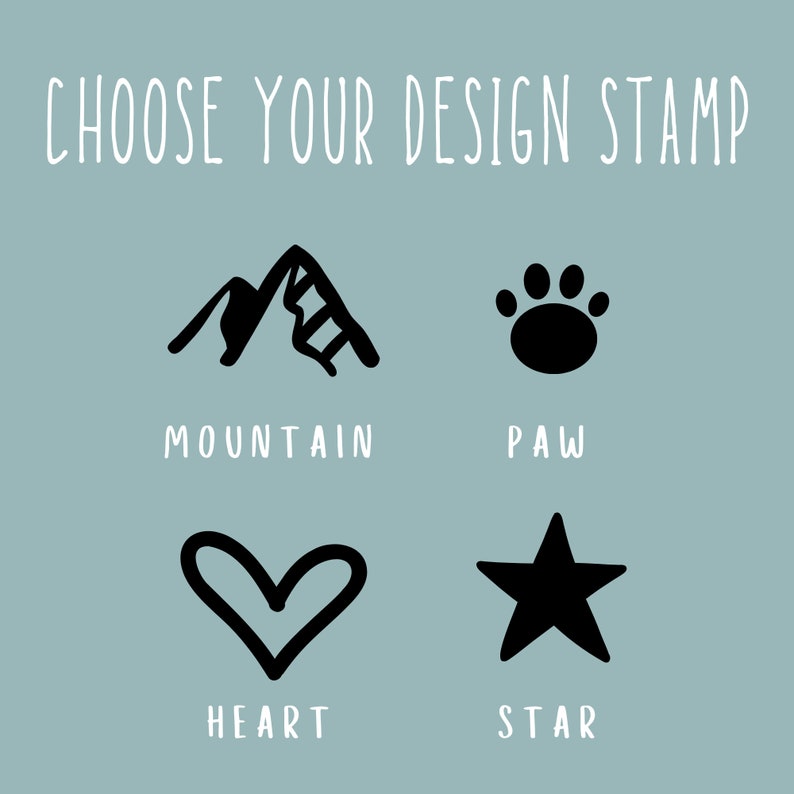 May include: Four black and white design options for a stamp: a mountain, a paw print, a heart, and a star. The text below each design reads "Mountain", "Paw", "Heart", and "Star".