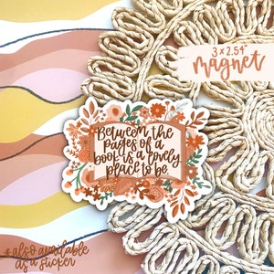 May include: A 3x2.54 inch magnet with a floral design and the text 