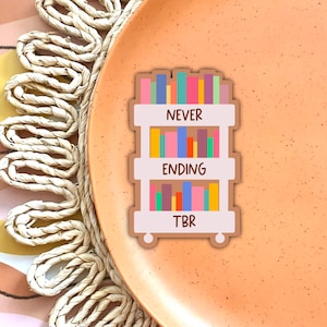 Never Ending TBR Vinyl Sticker - Bookish, Reader, Book Stack, Gifts, Present, Pink, Orange, Aesthetic, Romance, TBR Cart, Laptop, Accessory
