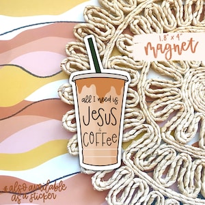 May include: A brown and white coffee cup with a straw. The cup has the text 