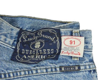 Men&#39;s Lucky Brand #91 Relaxed Fit Long Length Zipper Fly Premium Denim Blue Jeans Tag 36 measured Size 33x34 Made in the USA 1998