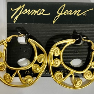 Made in the USA Norma Jean Designs Vintage pierced matte gold earrings.