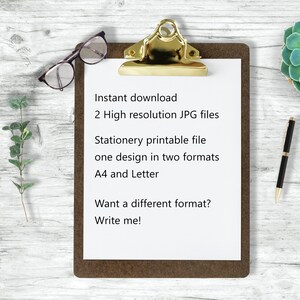 May include: A clipboard with a white sheet of paper on a wooden surface. The paper has text that reads: "Instant download, 2 High resolution JPG files, Stationery printable file, one design in two formats, A4 and Letter, Want a different format? Write me!"