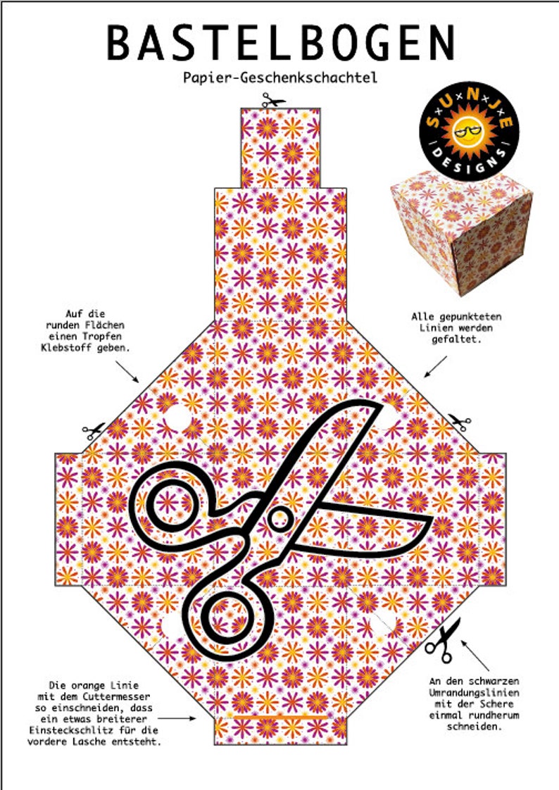 May include: A printable craft template for a gift box with a floral pattern. The template includes instructions for folding and cutting the paper to create the box. The text on the template reads "Bastelbogen Papier-Geschenkschachtel" and "SxUxNxJ+ Designs".