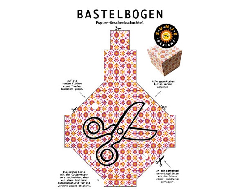 May include: A printable template for a gift box with a floral pattern. The template includes instructions for folding and cutting the paper. The box is designed to be assembled into a cube shape.