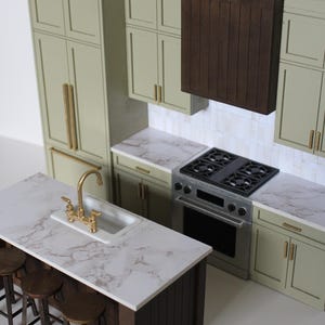 Modern Miniature Sage Green Kitchen Set for 1:12 scale dollhouse featuring an island with gold hardware and three bar stools