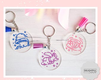 Disneyland Keychains • Choose your color • Disneyland Bag Charm • Matterhorn • Dumbo • Galaxy's Edge • Small World • Splash Mountain