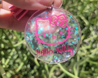Hello Kitty Acrylic Keychain – Pink Tassel Charm