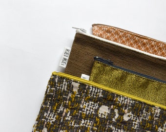 Quartet of clutches and patterned cases