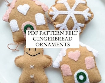May include: Four felt Christmas ornaments on a white plate. The ornaments are a gingerbread house, a gingerbread man, a snowflake, and another gingerbread house. The ornaments are all brown with white and pink details. The text "PDF PATTERN FELT GINGERBREAD ORNAMENTS" is in the center of the image.