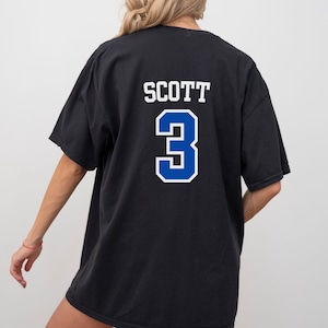 TREE HILL RAVENS, Unisex Garment-Dyed T-shirt, Scott 3, One Tree Hill, Oth Merch, North Carolina, Tree Hill Nc, Ravens, Gifts