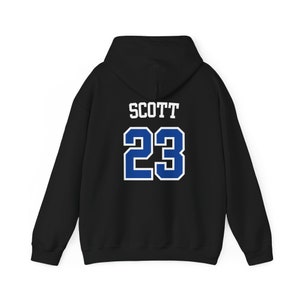 TREE HILL RAVENS-hoodie, uniseks Heavy Blend™-sweater met capuchon, One Tree Hill, Nathan Scott, 23, North Carolina, overige geschenken, Tree Hill-merchandise afbeelding 3