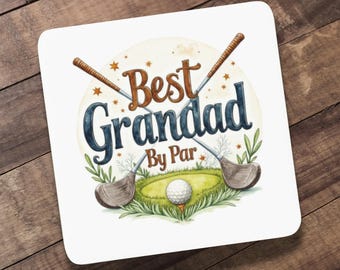 May include: A square white coaster with a golf-themed design. The text "Best Grandad By Par" is displayed in brown and blue lettering, with golf clubs and a golf ball on a green course.