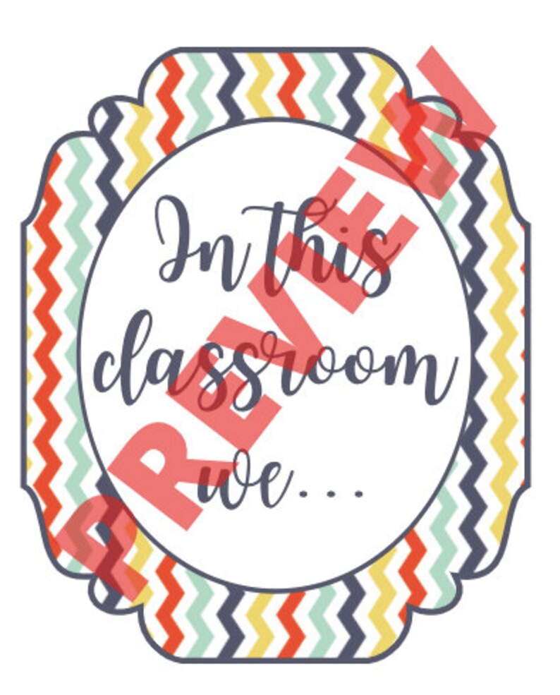 May include: A decorative sign with a white center and a colorful chevron border in red, yellow, blue, and green. The sign reads "In this classroom we..." in a cursive font.