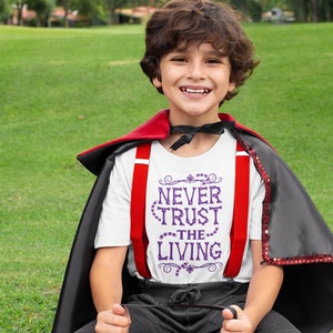 Never Trust The Living Toddler & Kids Youth T-Shirt, Kids Halloween Tees, Funny Halloween Shirts image 1