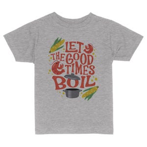 May include: Gray short-sleeved t-shirt with a red, yellow, and orange graphic that says "Let the good times boil". The graphic includes a pot, corn, and a crawfish.