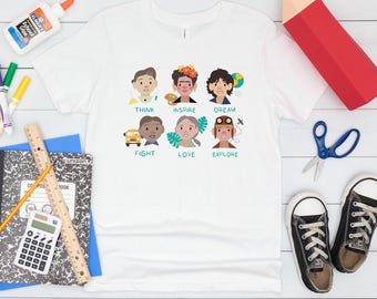 May include: White t-shirt with a colorful graphic of six different people with words below each person: Think, Inspire, Dream, Fight, Love, Explore.