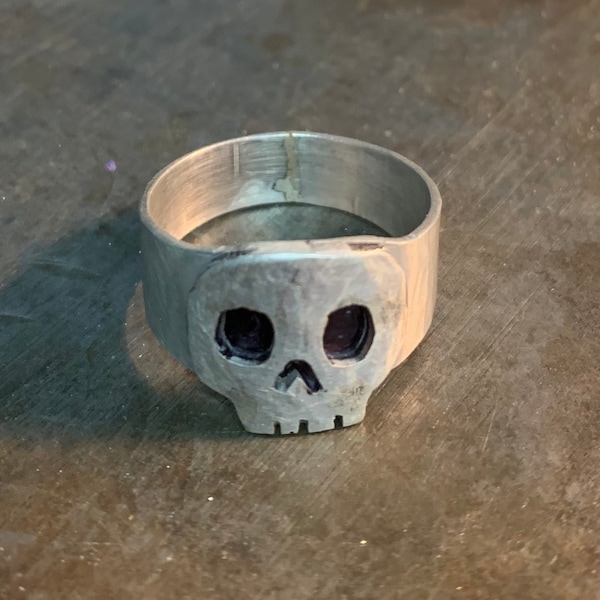Hand cut skull ring