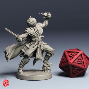 May include: A grey miniature figure with a pumpkin head, wearing a long coat and armour, holding a sword in one hand and a ball of fire in the other, standing on a base next to a large red twenty-sided die with visible numbers on its faces.