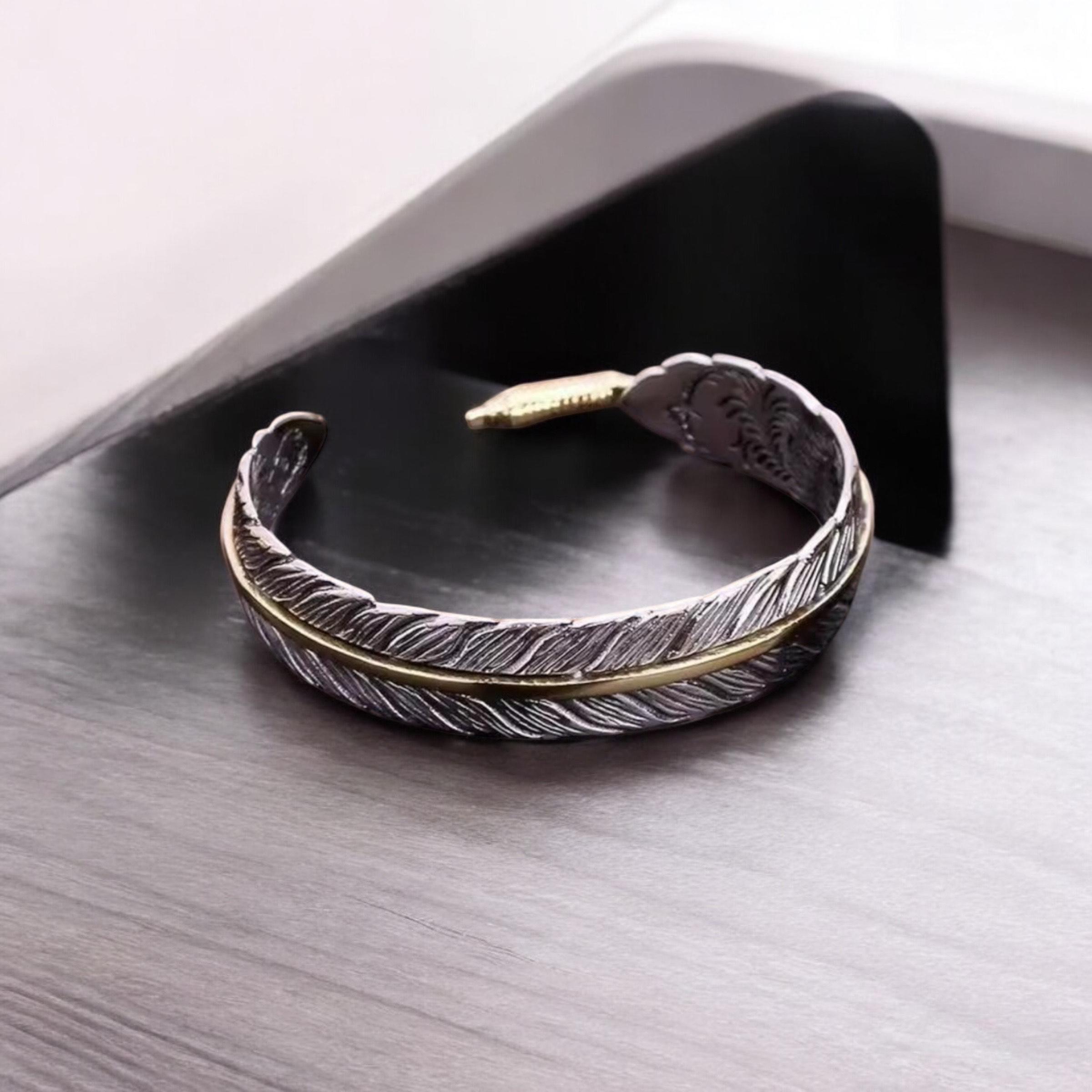 Sterling Silver Feather Cuff Bracelet: Gold Accent, Adjustable