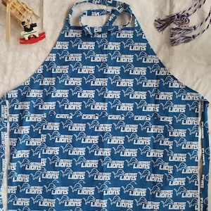 DETROIT LIONS APRON -  Self tie straps with 2 large pockets.  Light weight 100% cotton
